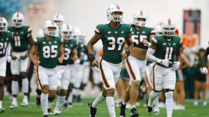 Oct 22, 2022; Miami Gardens, Florida, USA; Miami Hurricanes defensive lineman Cyrus Moss (39) runs