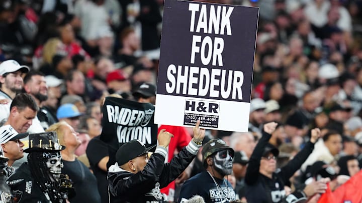 Dec 16, 2024; Paradise, Nevada, USA; A Las Vegas Raiders fan holds a sign during a game between Raiders and the Atlanta Falcons at Allegiant Stadium. Mandatory Credit: Stephen R. Sylvanie-Imagn Images Dec 16, 2024; Paradise, Nevada, USA; A Las Vegas Raiders fan holds a sign during a game between Raiders and the Atlanta Falcons at Allegiant Stadium. Mandatory Credit: Stephen R. Sylvanie-Imagn Images