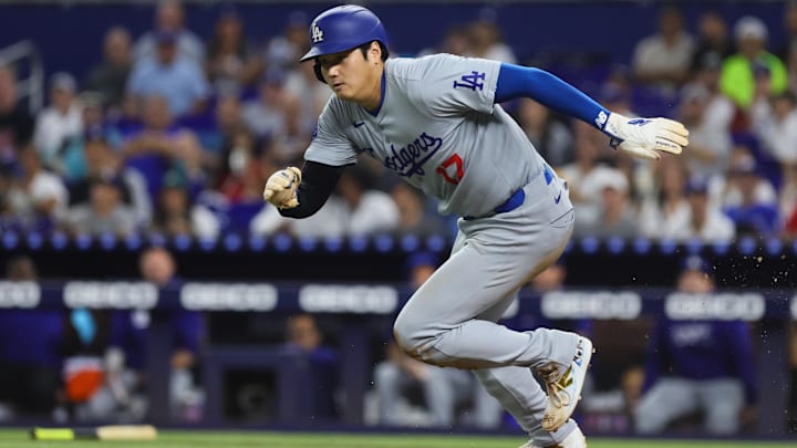 Sep 18, 2024; Miami, Florida, USA; Los Angeles Dodgers designated hitter Shohei Ohtani (17) runs back toward third base against the Miami Marlins during the first inning at loanDepot Park. 