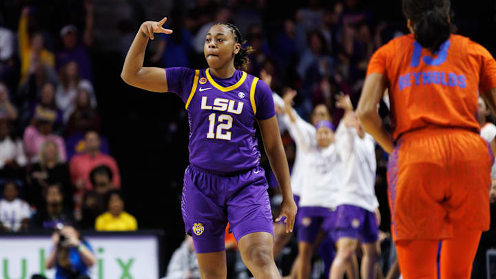 Jan 19, 2025; Gainesville, Florida, USA; LSU Tigers guard Mikaylah Williams (12) gestures after making a three-point basket against the Florida Gators during the first half at Exactech Arena at the Stephen C. O'Connell Center. Mandatory Credit: Matt Pendleton-Imagn Images Jan 19, 2025; Gainesville, Florida, USA; LSU Tigers guard Mikaylah Williams (12) gestures after making a three-point basket against the Florida Gators during the first half at Exactech Arena at the Stephen C. O'Connell Center. Mandatory Credit: Matt Pendleton-Imagn Images