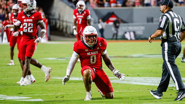 Sep 26, 2026; Raleigh, North Carolina, USA; NC State Wolfpack linebacker Popo Aguirre (0) celebrates his tackle during the first half of the game against App State Mountaineers at Carter-Finley Stadium. Mandatory Credit: Jaylynn Nash-Imagn Images Sep 26, 2026; Raleigh, North Carolina, USA; NC State Wolfpack linebacker Popo Aguirre (0) celebrates his tackle during the first half of the game against App State Mountaineers at Carter-Finley Stadium. Mandatory Credit: Jaylynn Nash-Imagn Images