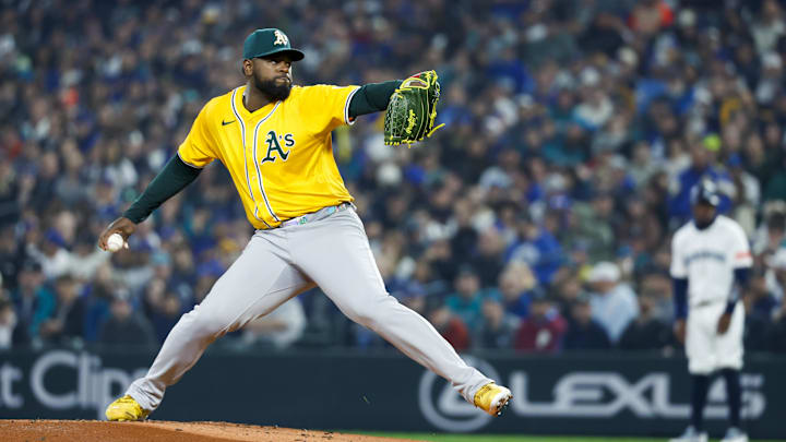 Mar 27, 2025; Seattle, Washington, USA; Athletics starting pitcher Luis Severino (40) throws against the Seattle Mariners during the first inning at T-Mobile Park. Mandatory Credit: Joe Nicholson-Imagn Images