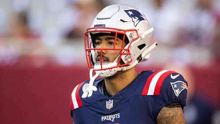 Dec 15, 2024; Glendale, Arizona, USA; New England Patriots wide receiver Ja'Lynn Polk (1) against the Arizona Cardinals at State Farm Stadium. Mandatory Credit: Mark J. Rebilas-Imagn Images