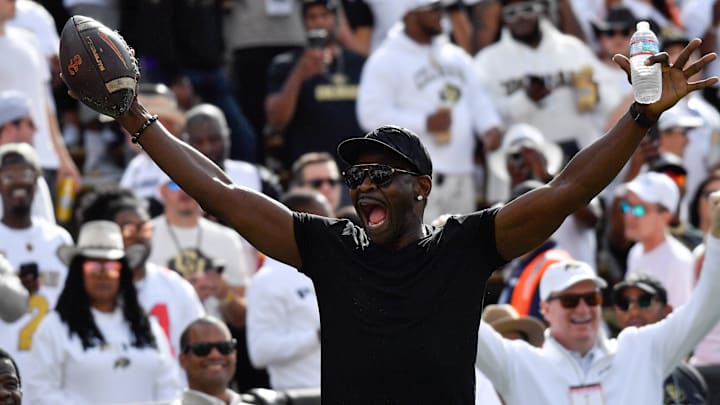 Former Cowboys WR Michael Irvin reacts to the crowd during the opening kickoff between the Colorado Buffaloes and USC Trojans.
