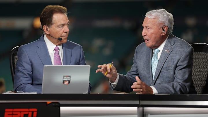 Jan 9, 2025; Miami, FL, USA; ESPN analysts Nick Saban and Lee Corso before the game between the Notre Dame Fighting Irish and the Penn State Nittany Lions in the Orange Bowl at Hard Rock Stadium. Mandatory Credit: Nathan Ray Seebeck-Imagn Images