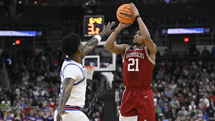 Mar 20, 2025; Providence, RI, USA;  Arkansas Razorbacks guard D.J. Wagner (21) looks to shoot against Kansas Jayhawks second half at Amica Mutual Pavilion. Mandatory Credit: Eric Canha-Imagn Images
