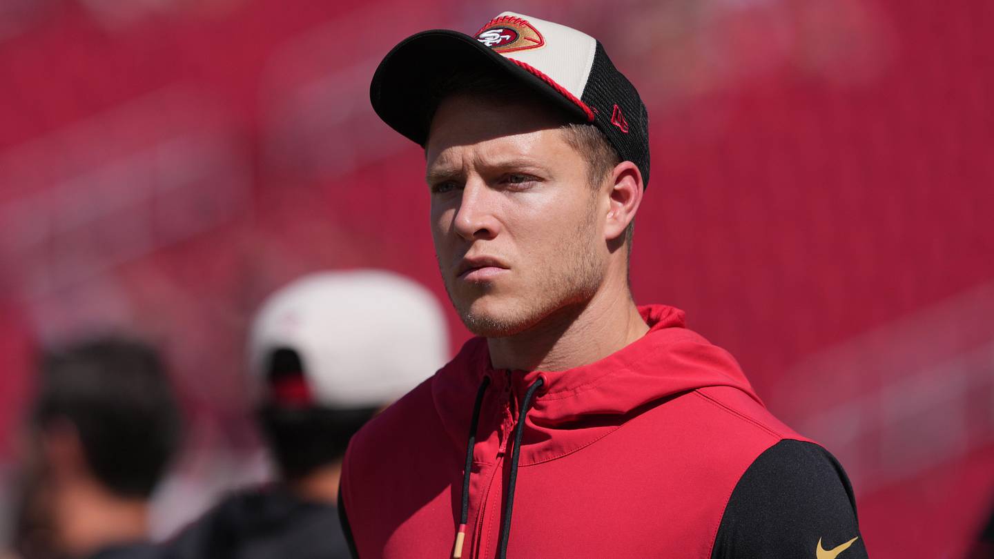 Christian McCaffrey's wife wears knee-high stockings as seductive Dorothy from Oz