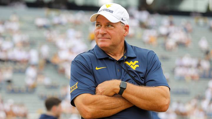 Sep 5, 2026; Morgantown, West Virginia, USA; West Virginia Mountaineers head coach Rich Rodriguez watches during warmups before their game against the Coastal Carolina Chanticleers at Milan Puskar Stadium. Mandatory Credit: Ben Queen-Imagn Images