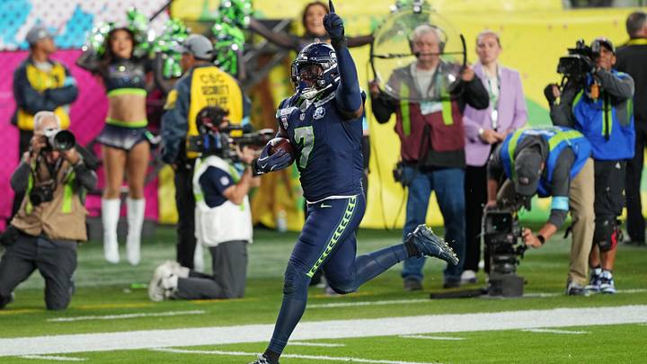 Seattle Seahawks linebacker Uchenna Nwosu (7) scores a touch down during the fourth quarter against the New England Patriots in Super Bowl LX.