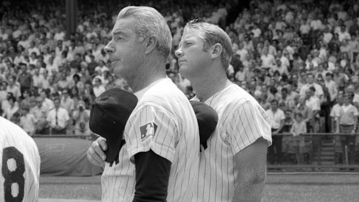 August 8, 1970; New York, NY, USA; Yankees Old Timers Joe DiMaggio and Mickey Mantle pause for the national anthem at the start of the annual Old-Timers' Day game at Yankee Stadium 