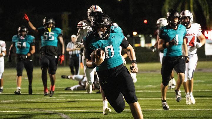 Gio Marenco (0) of Gulf Coast High School, scores during a 50-43 win against Estero at Gulf Coast in Naples on Sept. 10, 2026. Marenco rushed for a school record 405 yards and six touchdowns in the game. Gio Marenco (0) of Gulf Coast High School, scores during a 50-43 win against Estero at Gulf Coast in Naples on Sept. 10, 2026. Marenco rushed for a school record 405 yards and six touchdowns in the game.
