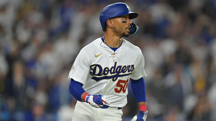Mar 27, 2026; Los Angeles, California, USA; Los Angeles Dodgers shortstop Mookie Betts (50) runs after hitting a three run home run against the Arizona Diamondbacks in the third inning at Dodger Stadium. Mandatory Credit: Jayne Kamin-Oncea-Imagn Images Mar 27, 2026; Los Angeles, California, USA; Los Angeles Dodgers shortstop Mookie Betts (50) runs after hitting a three run home run against the Arizona Diamondbacks in the third inning at Dodger Stadium. Mandatory Credit: Jayne Kamin-Oncea-Imagn Images