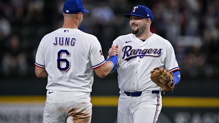 Texas Rangers third baseman Josh Jung and first baseman Jake Burger celebrate a win.