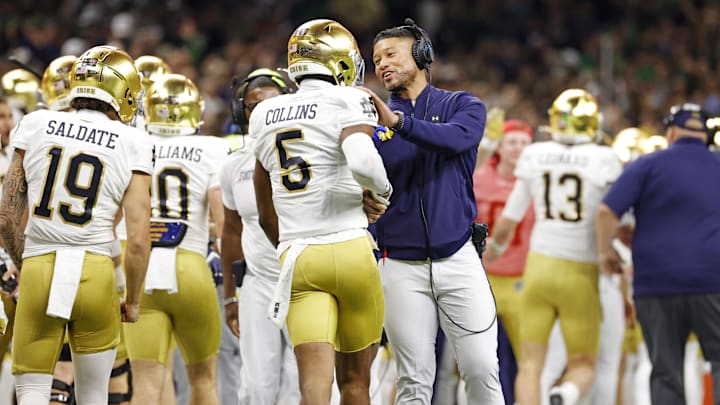Jan 2, 2025; New Orleans, LA, USA; Notre Dame Fighting Irish wide receiver Beaux Collins (5) celebrates after scoring a touch down during the second quarter against Georgia Bulldogs at Caesars Superdome. 