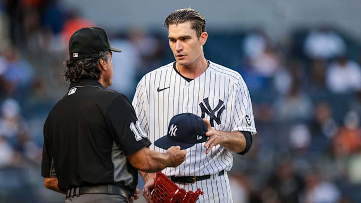 Aug 2, 2021; Bronx, New York, USA; Former Yankees Pitcher Announces Retirement from Baseball York Yankees starting pitcher Andrew Heaney (38) is checked by umpire Phil Cuzzi (10) during the middle of the second inning against the Baltimore Orioles at Yankee Stadium. Mandatory Credit: Vincent Carchietta-Imagn Images