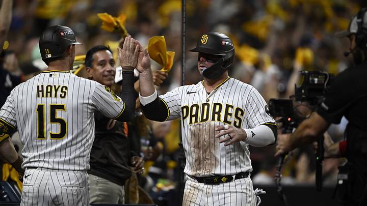 San Diego Padres first baseman Ty France (25) is congratulated by designated hitter Austin Hays (15) after scoring in the second inning against the Chicago Cubs during game two of the wild-card round for the 2026 MLB Playoffs at Petco Park on Sept. 30, 2026. San Diego Padres first baseman Ty France (25) is congratulated by designated hitter Austin Hays (15) after scoring in the second inning against the Chicago Cubs during game two of the wild-card round for the 2026 MLB Playoffs at Petco Park on Sept. 30, 2026.