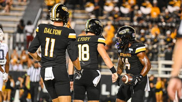 Southern Miss quarterback Landry Lyddy (18) with teammates Davis Dalton (11) and Steven Robinson (14) during Saturday's game against UConn at The Rock. Southern Miss quarterback Landry Lyddy (18) with teammates Davis Dalton (11) and Steven Robinson (14) during Saturday's game against UConn at The Rock.
