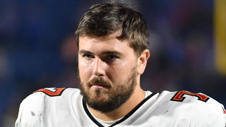 Oct 26, 2023; Orchard Park, New York, USA; Tampa Bay Buccaneers offensive tackle Justin Skule (77) on the sidelines during a game against the Buffalo Bills at Highmark Stadium. Mandatory Credit: Mark Konezny-Imagn Images