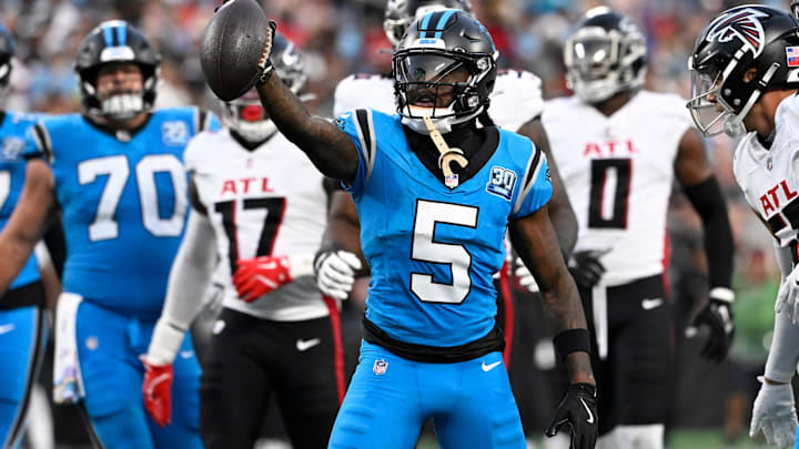 Oct 13, 2024; Charlotte, North Carolina, USA; Carolina Panthers wide receiver Diontae Johnson (5) reacts after making a catch in the second quarter at Bank of America Stadium. 