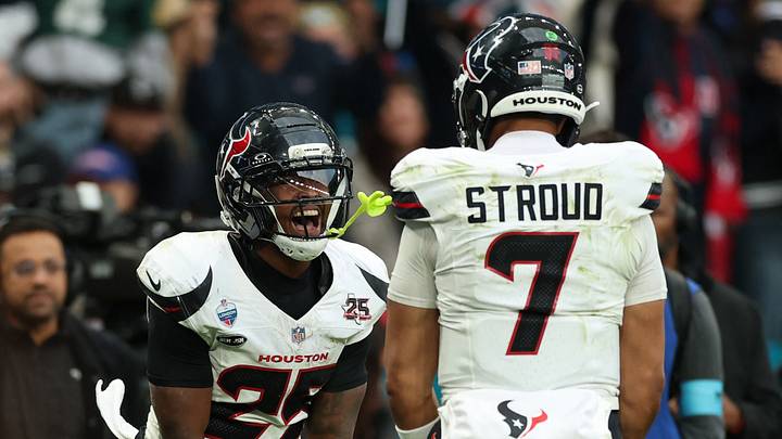 Football - NFL - Houston Texans v Jacksonville Jaguars - Wembley Stadium, London, Britain - October 18, 2026 Houston Texans' Jawhar Jordan celebrates scoring their fourth touchdown with C.J. Stroud 