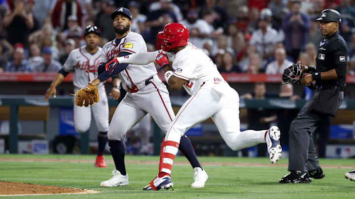 Apr 7, 2026; Anaheim, California, USA; A fight breaks out between Atlanta Braves pitcher Reynaldo López (40) and Los Angeles Angels right fielder Jorge Soler (12) during the fifth inning at Angel Stadium. Mandatory Credit: William Navarro-Imagn Images