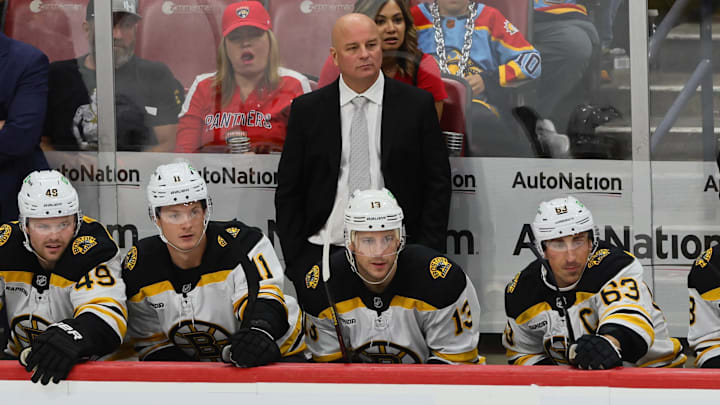 Oct 8, 2024; Sunrise, Florida, USA; Boston Bruins head coach Jim Montgomery looks on from the bench against the Florida Panthers during the third period at Amerant Bank Arena. Mandatory Credit: Sam Navarro-Imagn Images