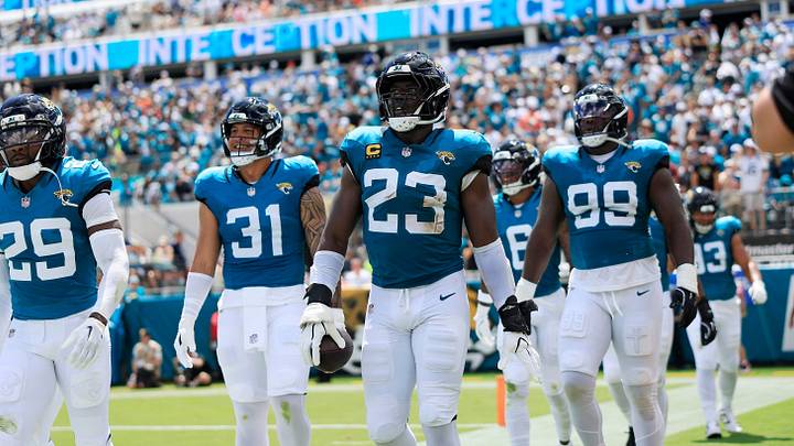Jacksonville Jaguars linebacker Foyesade Oluokun (23) walks off with his interception during the first quarter of an NFL football matchup at EverBank Stadium on Sunday, Sept. 13, 2026, in Jacksonville, Fla. [Corey Perrine/Florida Times-Union]