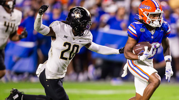 Florida Gators wide receiver Tank Hawkins (10) outruns UCF Knights defensive back Mac McWilliams (20) during the first half at Ben Hill Griffin Stadium in Gainesville, FL on Saturday, October 5, 2024. [Doug Engle/Gainesville Sun]