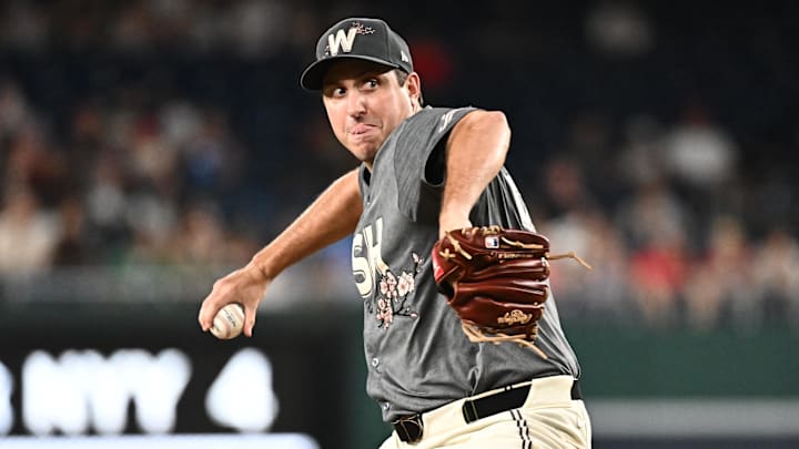 Aug 10, 2024; Washington, District of Columbia, USA;  Washington Nationals relief pitcher Derek Law (58) delivers a pitch during the ninth inning against the Los Angeles Angels at Nationals Park. 