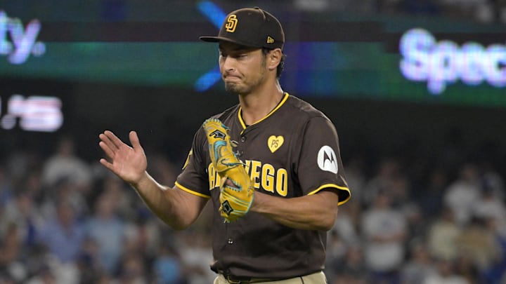 Oct 6, 2024; Los Angeles, California, USA; San Diego Padres pitcher Yu Darvish (11) reacts after an out in the seventh inning against the Los Angeles Dodgers during game two of the NLDS for the 2024 MLB Playoffs at Dodger Stadium. Mandatory Credit: Jayne Kamin-Oncea-Imagn Images