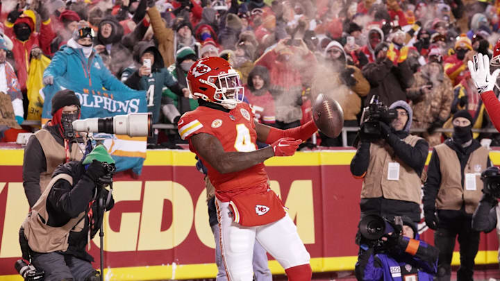 Jan 13, 2024; Kansas City, Missouri, USA; Kansas City Chiefs wide receiver Rashee Rice (4) celebrates his touchdown scored against the Miami Dolphins during the first half of the 2024 AFC wild card game at GEHA Field at Arrowhead Stadium. Mandatory Credit: Denny Medley-Imagn Images Jan 13, 2024; Kansas City, Missouri, USA; Kansas City Chiefs wide receiver Rashee Rice (4) celebrates his touchdown scored against the Miami Dolphins during the first half of the 2024 AFC wild card game at GEHA Field at Arrowhead Stadium. Mandatory Credit: Denny Medley-Imagn Images