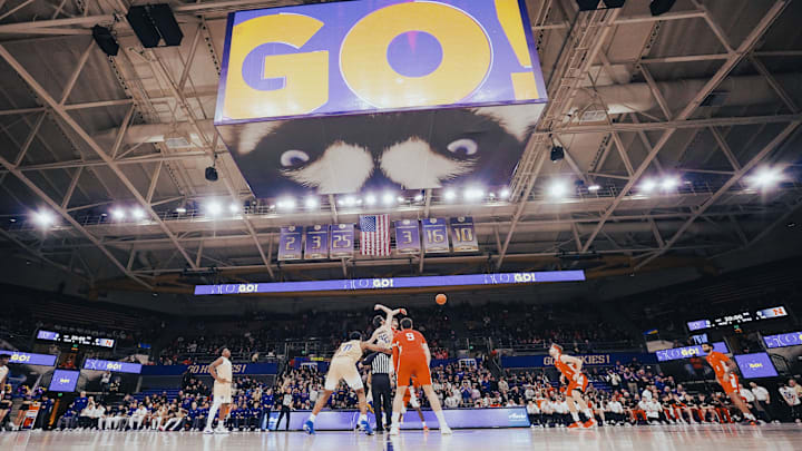 Opening tip at Alaska Airlines Arena. 
