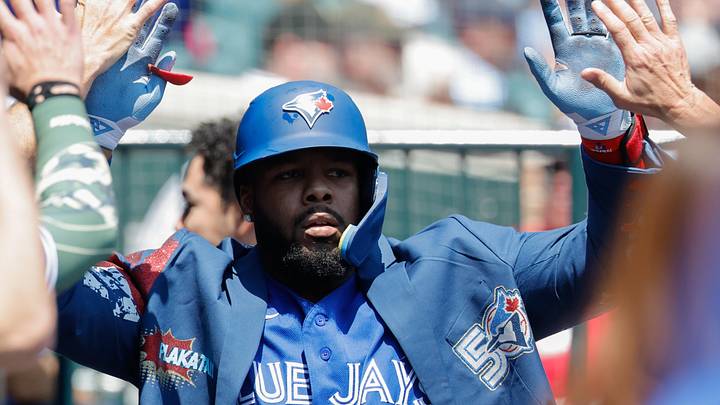 Toronto Blue Jays first baseman Vladimir Guerrero Jr. receives congratulations from teammates after he hits a home run. Toronto Blue Jays first baseman Vladimir Guerrero Jr. receives congratulations from teammates after he hits a home run.