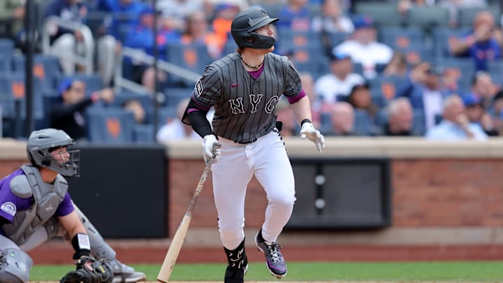 May 31, 2025; New York City, New York, USA; New York Mets third baseman Brett Baty (7) follows through on a three run triple against the Colorado Rockies during the first inning at Citi Field. Mandatory Credit: Brad Penner-Imagn Images
