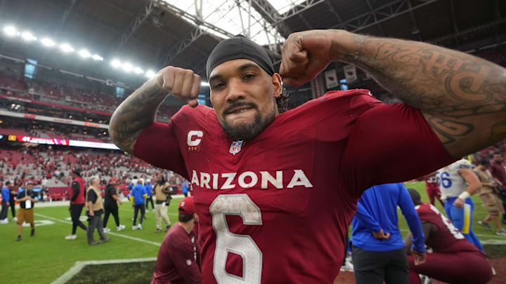 Cardinals running back Conner celebrates as he walks off the field after their 41-10 win over the Los Angeles Rams at State Farm Stadium. Cardinals running back Conner celebrates as he walks off the field after their 41-10 win over the Los Angeles Rams at State Farm Stadium.