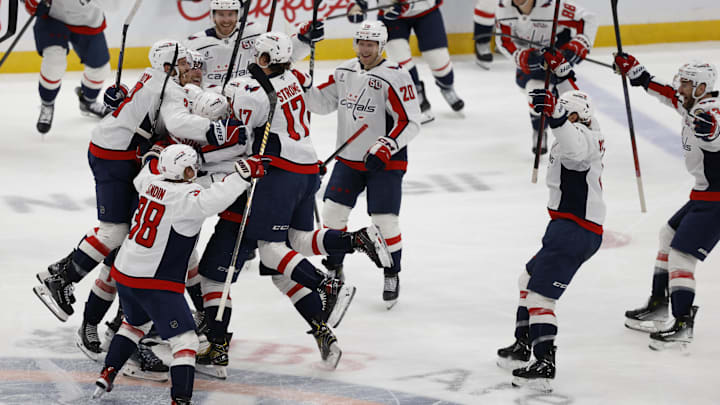 Apr 6, 2025; Elmont, New York, USA;  Washington Capitals left wing Alex Ovechkin (8) celebrates after scoring in the during the second period against the New York Islanders at UBS Arena. Ovechkin scored the 895th goal of his career, breaking the NHL all-time career goals record previously held by Wayne Gretzky at UBS Arena. Mandatory Credit: Geoff Burke-Imagn Images