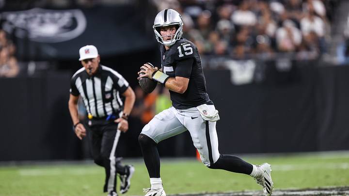 Aug 27, 2026; Paradise, Nevada, USA; Las Vegas Raiders quarterback Fernando Mendoza (15) rolls out of the pocket against the San Francisco 49ers during the second half at Allegiant Stadium. Mandatory Credit: Christopher Trim-Imagn Images