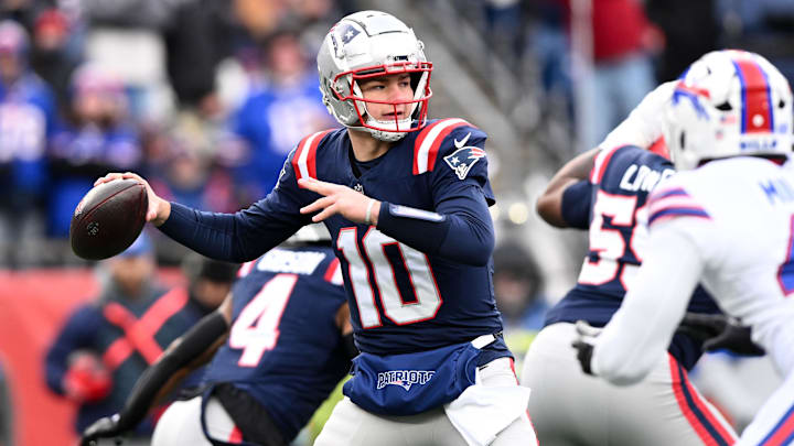 Jan 5, 2025; Foxborough, Massachusetts, USA; New England Patriots quarterback Drake Maye (10) looks to throw against the Buffalo Bills during the first half at Gillette Stadium. Mandatory Credit: Brian Fluharty-Imagn Images
