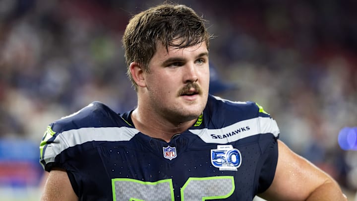 Sep 25, 2025; Glendale, Arizona, USA; Seattle Seahawks guard Grey Zabel (76) against the Arizona Cardinals at State Farm Stadium. Mandatory Credit: Mark J. Rebilas-Imagn Images