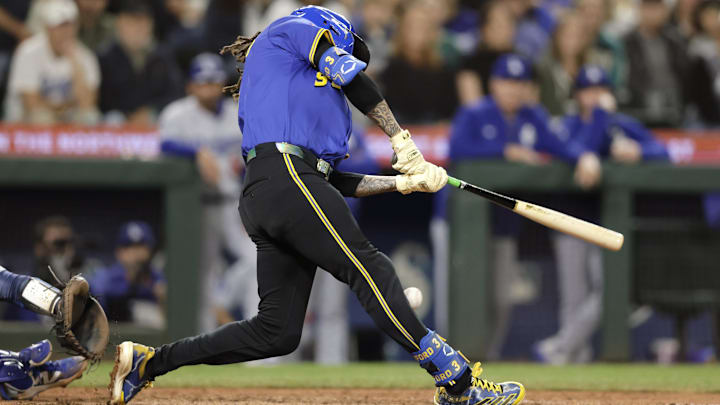Sep 26, 2025; Seattle, Washington, USA; Seattle Mariners shortstop J.P. Crawford (3) fouls the ball off himself against the Los Angeles Dodgers during the eighth inning at T-Mobile Park. Mandatory Credit: John Froschauer-Imagn Images
