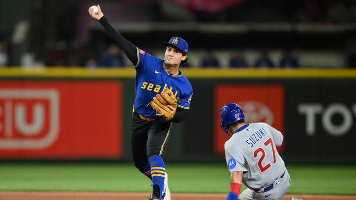 Aug 21, 2026; Seattle, Washington, USA; Seattle Mariners second baseman Cole Young (2) throws to first base to complete the double play against the Chicago Cubs during the seventh inning at T-Mobile Park. Mandatory Credit: Steven Bisig-Imagn Images Aug 21, 2026; Seattle, Washington, USA; Seattle Mariners second baseman Cole Young (2) throws to first base to complete the double play against the Chicago Cubs during the seventh inning at T-Mobile Park. Mandatory Credit: Steven Bisig-Imagn Images