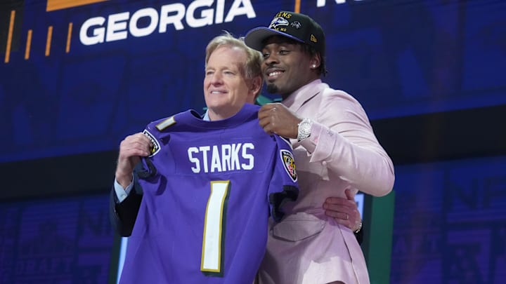 Apr 24, 2025; Green Bay, WI, USA; NFL commissioner Roger Goodell with Georgia Bulldogs safety Malaki Starks after he is selected by the Baltimore Ravens as the number 27 pick in the first round of the 2025 NFL Draft at Lambeau Field. Mandatory Credit: Kirby Lee-Imagn Images