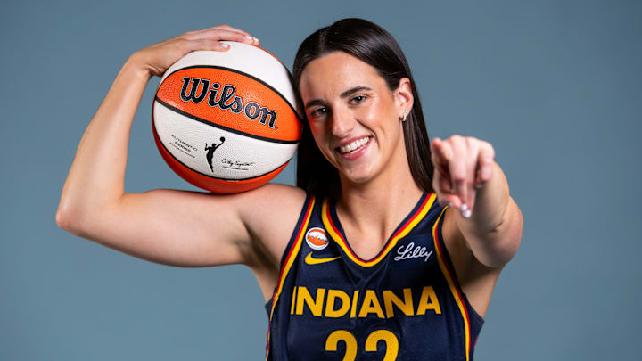 Indiana Fever guard Caitlin Clark (22) poses for a photo Wednesday, April 22, 2026, during media day at Gainbridge Fieldhouse in Indianapolis.