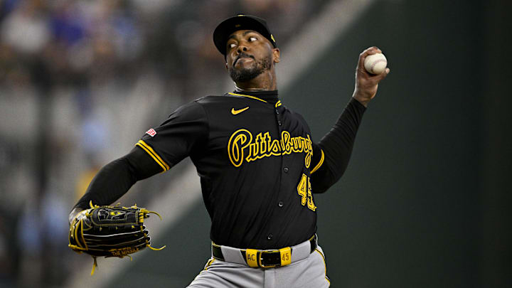 Aug 21, 2024; Arlington, Texas, USA; Pittsburgh Pirates relief pitcher Aroldis Chapman (45) pitches against the Texas Rangers during the eighth inning at Globe Life Field.