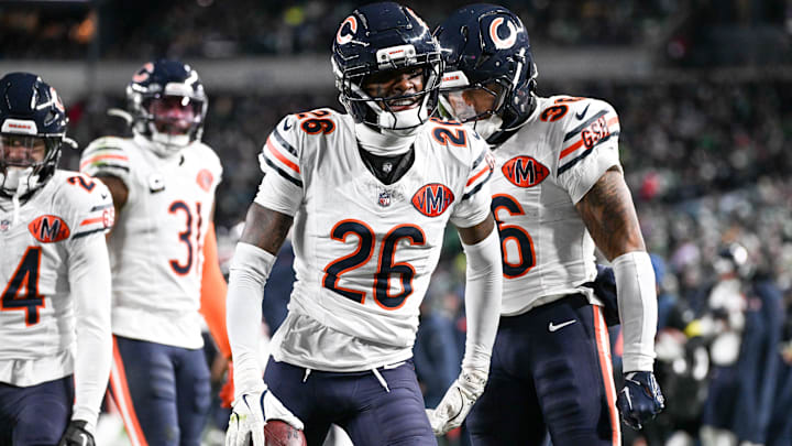 Nahshon Wright and the Bears defense celebrate both stuffing the tush push and taking away the ball on the play.