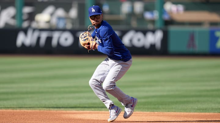 Mar 25, 2025; Anaheim, California, USA; Los Angeles Dodgers shortstop Mookie Betts (50) throws the ball before the game against the Los Angeles Angels at Angel Stadium. Mandatory Credit: Kirby Lee-Imagn Images Mar 25, 2025; Anaheim, California, USA; Los Angeles Dodgers shortstop Mookie Betts (50) throws the ball before the game against the Los Angeles Angels at Angel Stadium. Mandatory Credit: Kirby Lee-Imagn Images