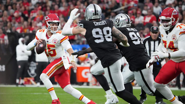 Nov 26, 2023; Paradise, Nevada, USA; Kansas City Chiefs quarterback Patrick Mahomes (15) is pressured by Las Vegas Raiders defensive end Maxx Crosby (98) and defensive tackle Bilal Nichols (91) in the first half at Allegiant Stadium. Mandatory Credit: Kirby Lee-Imagn Images Nov 26, 2023; Paradise, Nevada, USA; Kansas City Chiefs quarterback Patrick Mahomes (15) is pressured by Las Vegas Raiders defensive end Maxx Crosby (98) and defensive tackle Bilal Nichols (91) in the first half at Allegiant Stadium. Mandatory Credit: Kirby Lee-Imagn Images