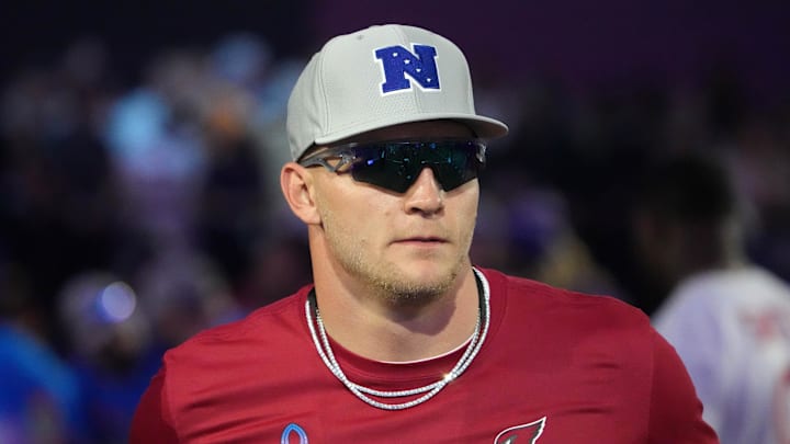 Trey McBride watches Pro Bowl activities.