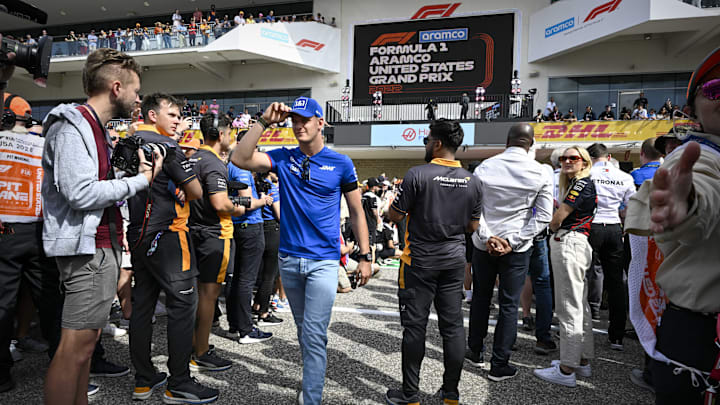 Oct 23, 2022; Austin, Texas, USA; Haas F1 Team driver Mick Schumacher (47) of Team Germany walks on to the track before the running of the U.S. Grand Prix F1 race at Circuit of the Americas. Mandatory Credit: Jerome Miron-Imagn Images