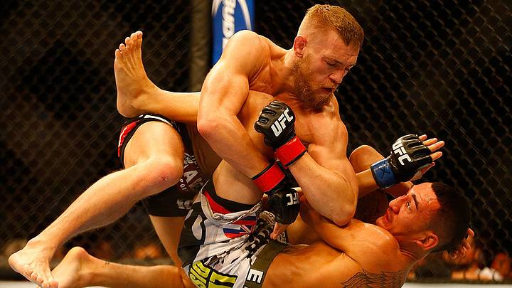 McGregor venció a Holloway en la pelea que protagonizaron en Boston en 2013. McGregor venció a Holloway en la pelea que protagonizaron en Boston en 2013.